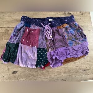 Advance Apparels women’s purple patchwork shorts with pockets, size S/M